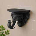 Zwarte olifant wandplank met witte slagtanden als wanddecoratie